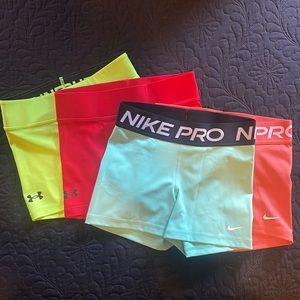 4 pair Under Amor & Nike gym shorts - size SMALL